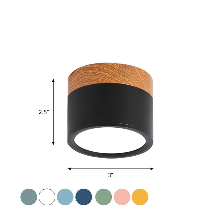 Black sleek LED flush mount cylindrical ceiling fixture, a modern & energy-saving light for any room.