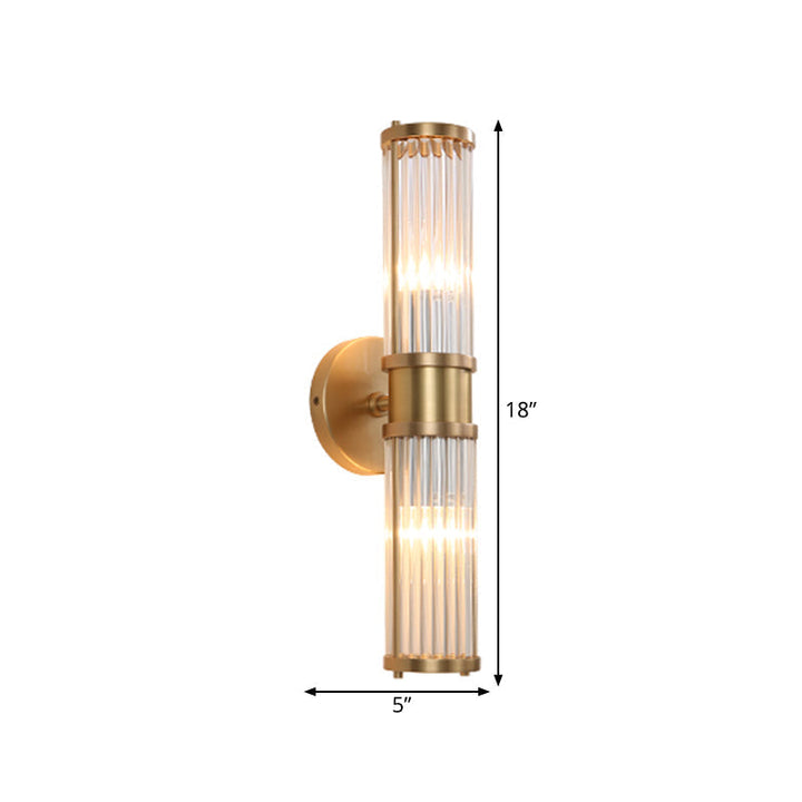 Contemporary 2-light gold wall sconce featuring dazzling crystal cylinder shades, indoor lighting.