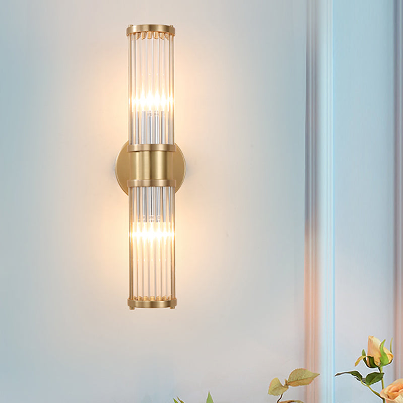 Luxury 1-light crystal wall sconce in polished gold, ideal for contemporary home lighting.