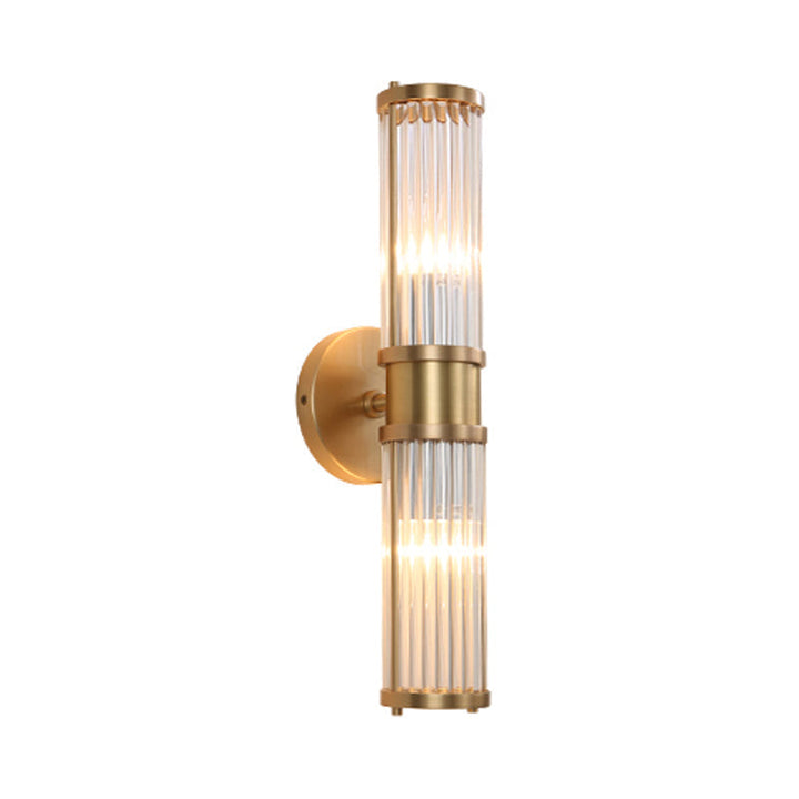 Art deco inspired gold wall lamp with cylindrical crystal diffuser, beautiful indoor fixture.