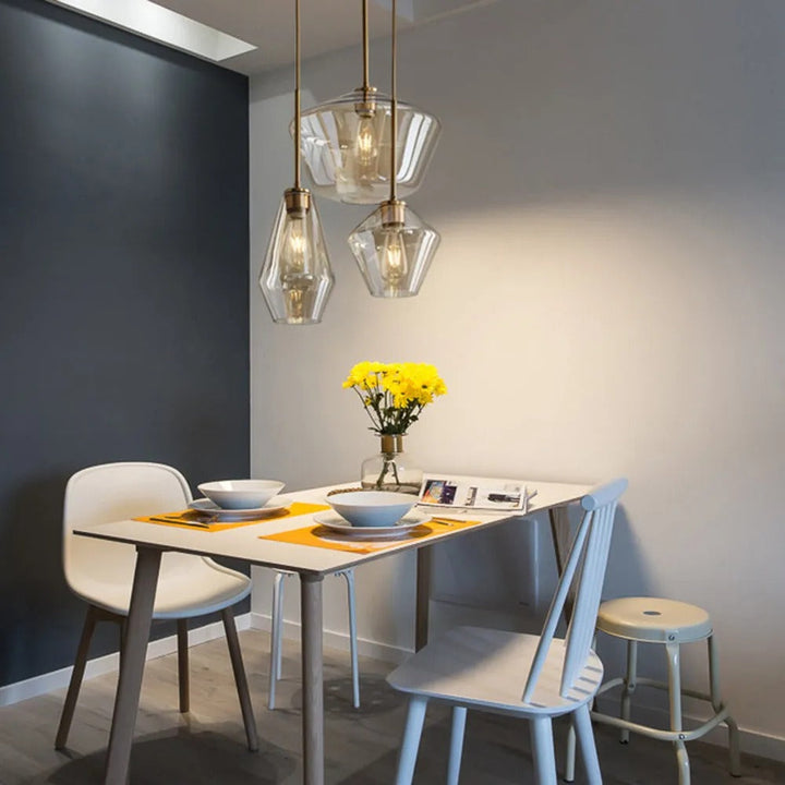 Amber diamond glass pendant light for a warm, modern living space.