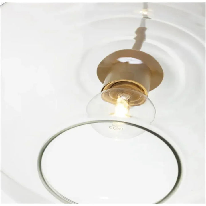 Dazzling modern glass pendant light with diamond facets.