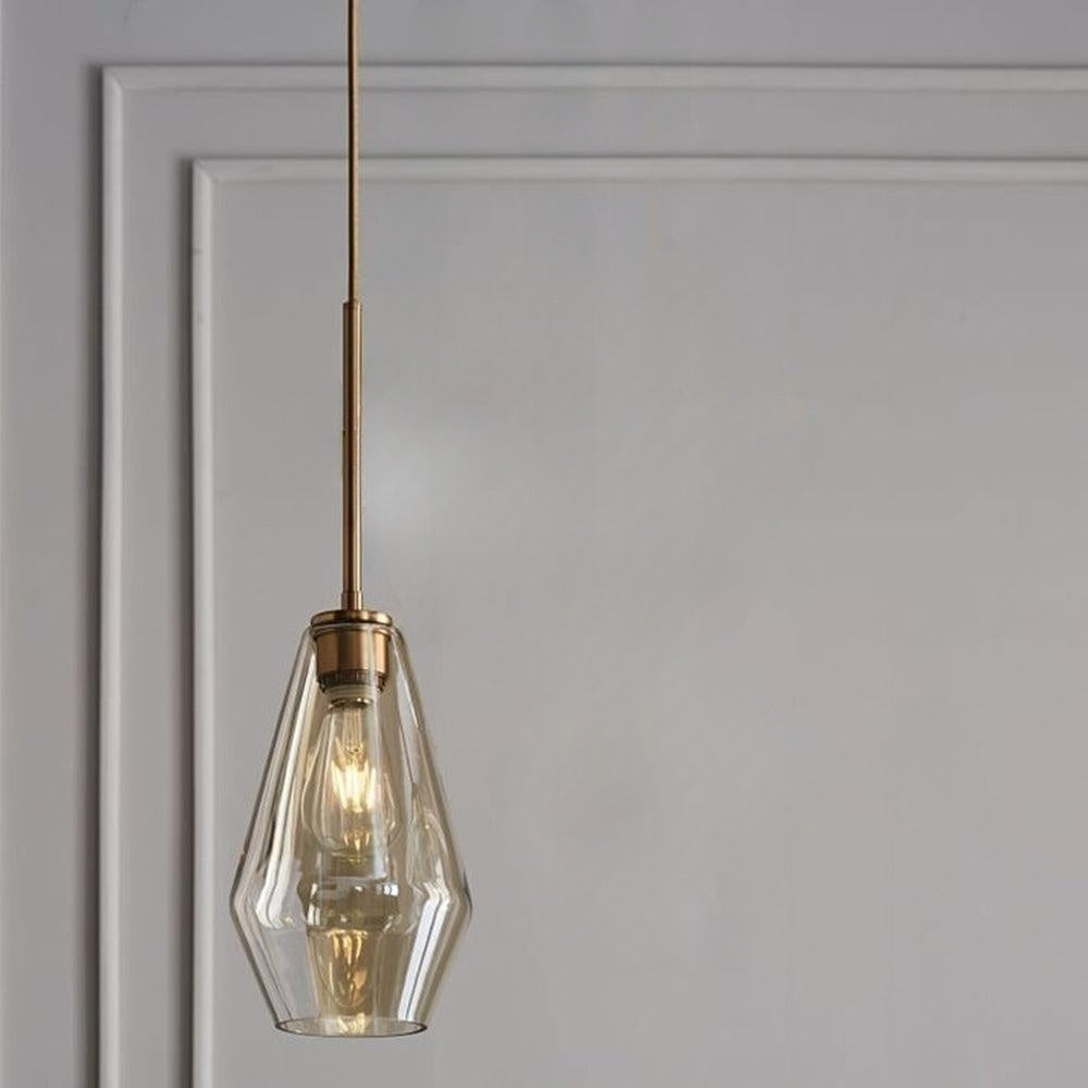 Adjustable modern diamond glass pendant light for stylish interiors.