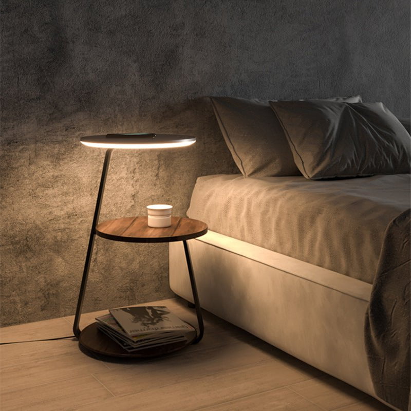 Modern double-layered side table with stone top, steel frame, and storage for living rooms.