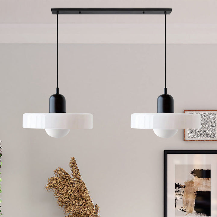 Contemporary modern double glass pendant light, ideal for home decor.