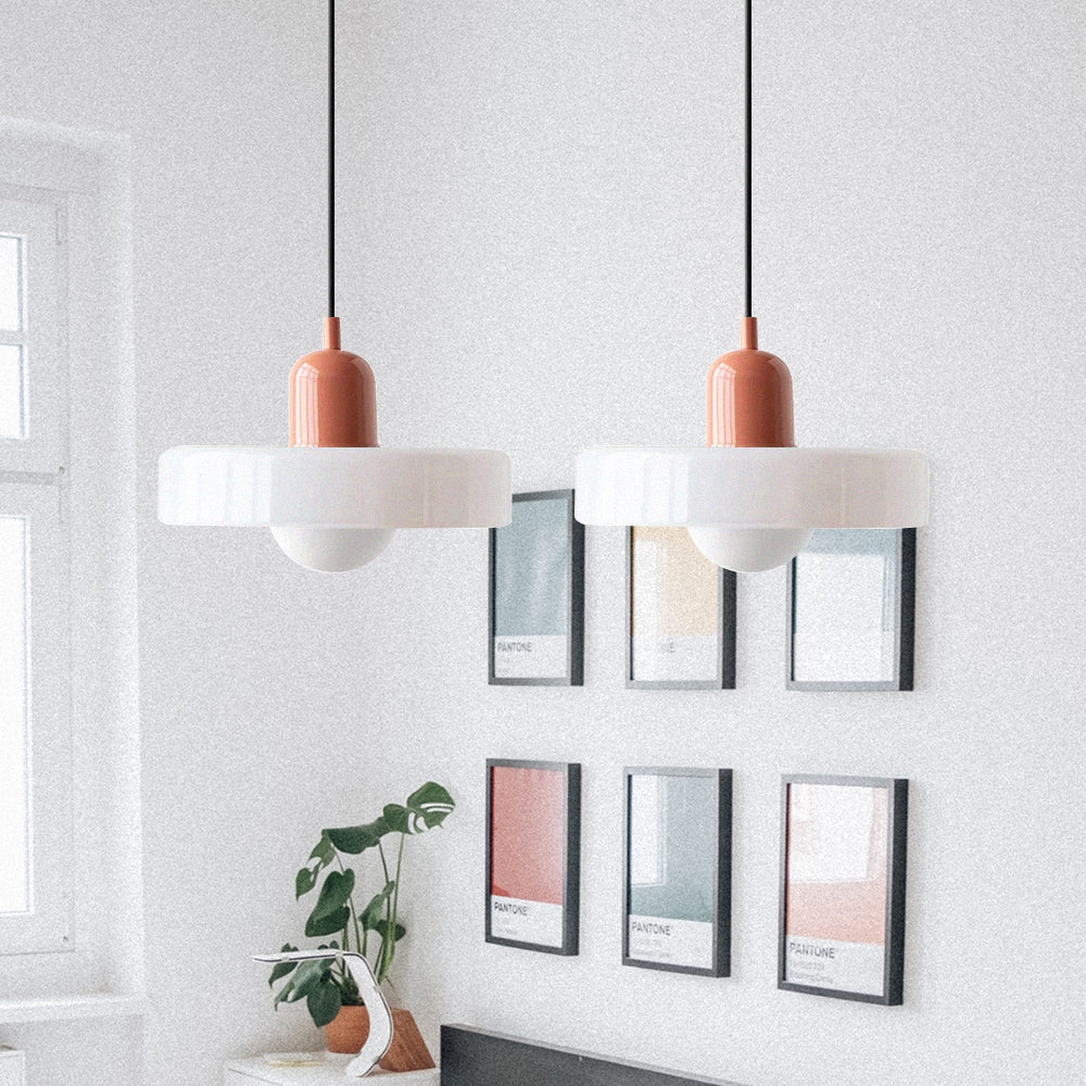 Modern elegant double pendant light, glass shades, for sophisticated dining rooms.