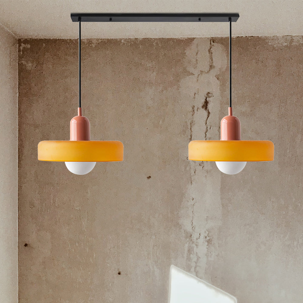 Dual-tone modern pendant light, elegant glass, perfect for dining room.