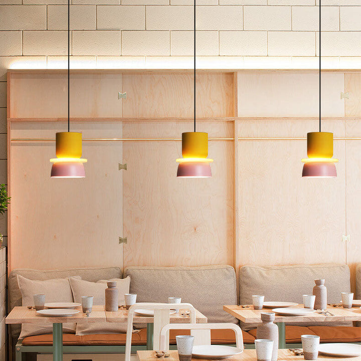 Close-up of modern dual-tone Nordic dome pendant light. Contemporary zinc alloy ceiling lamp.
