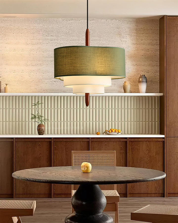 Elegant fabric pendant light, modern design with wood accents for kitchen islands.