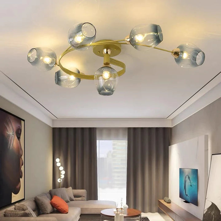 Sculptural gold flush mount light, statement piece for modern dining.