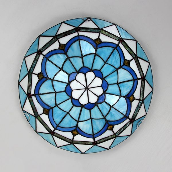 Designer flush mount ceiling light, modern artistic accent for sophisticated home decor.