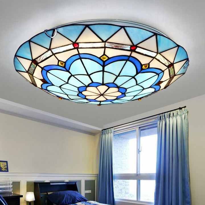 Contemporary flush mount light fixture, artistic design brightens modern indoor settings.