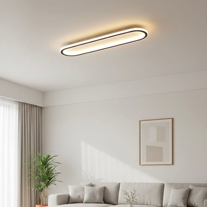Versatile geometric LED ceiling light, dimmable for various rooms, modern contemporary design.