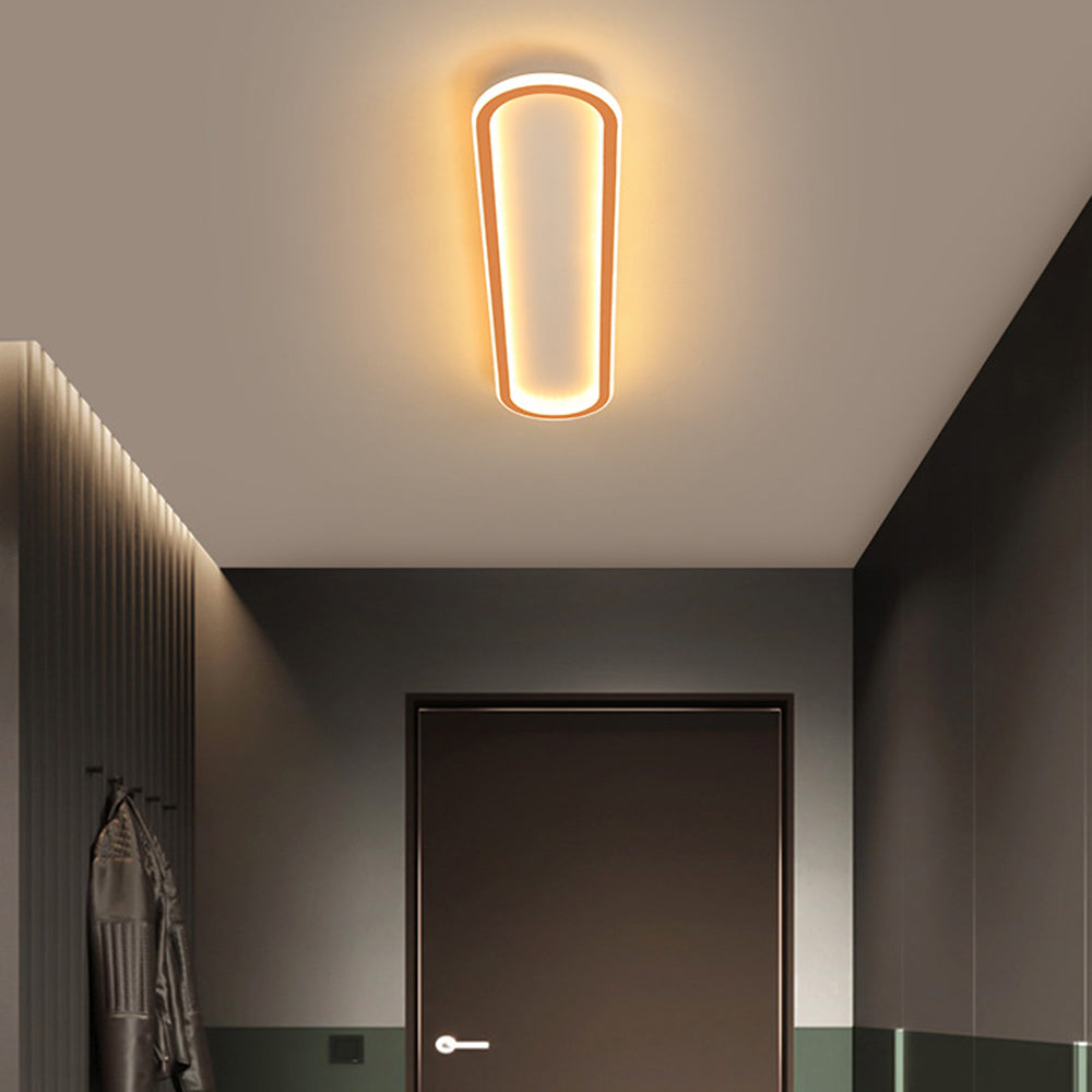 Rose gold geometric LED ceiling light, modern dimmable fixture for stylish interior lighting.