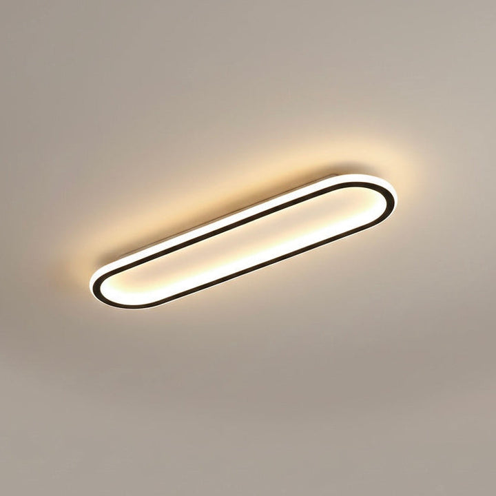 Contemporary geometric LED ceiling light, dimmable, modern rose gold fixture for interior design.