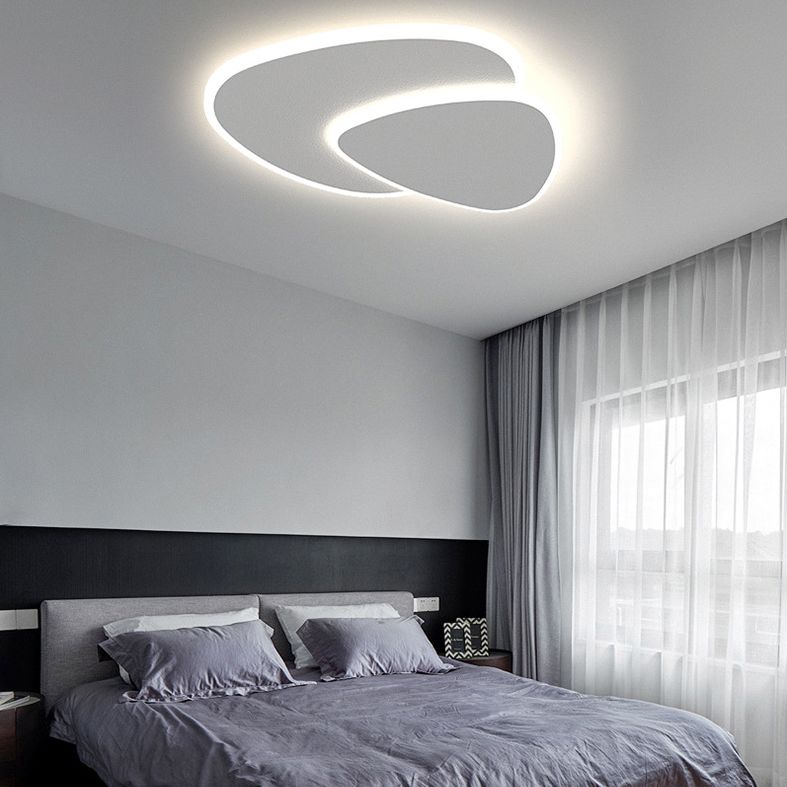 Contemporary geometric LED triangle ceiling light, a stylish flush mount fixture for modern spaces.