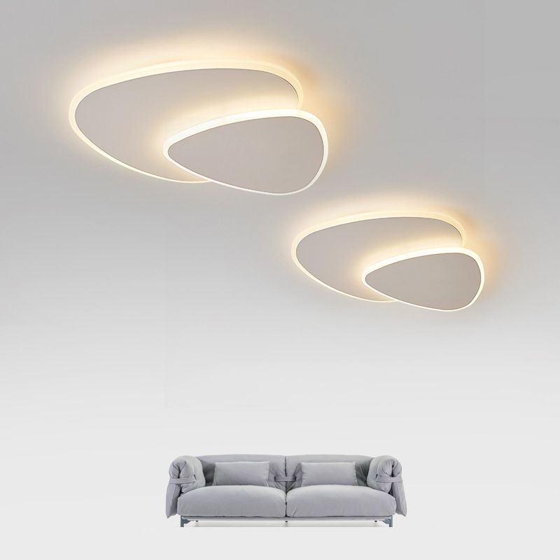 Modern geometric LED triangle flush mount light, dimmable, adjustable color, energy efficient.