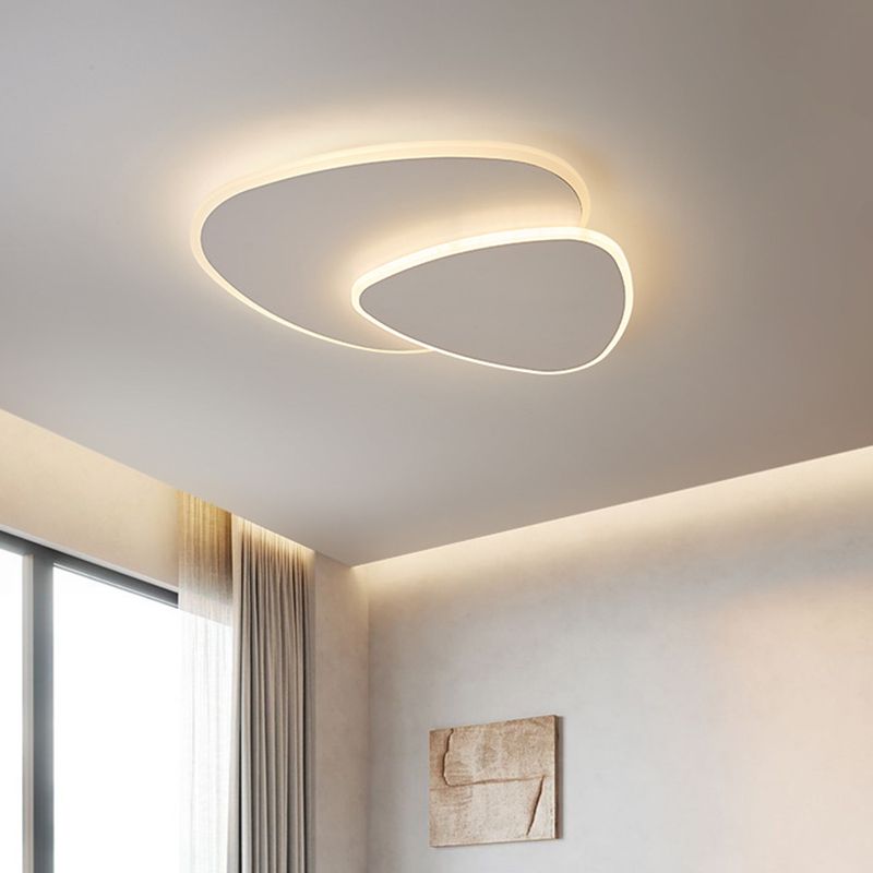 Minimalist LED triangle flush mount light for modern homes, adjustable color, bright.
