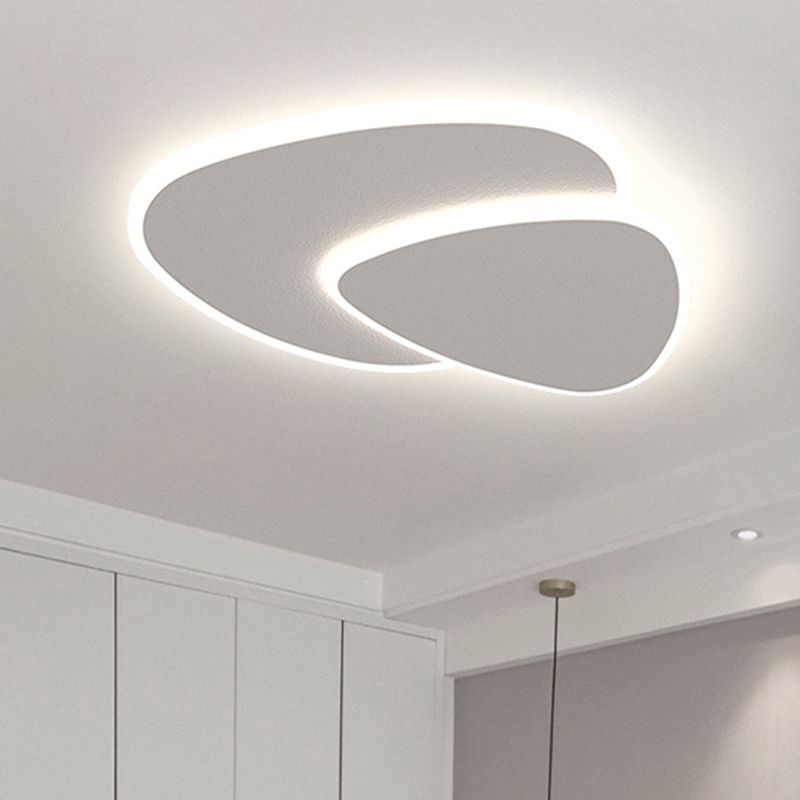 Dimmable LED geometric triangle ceiling light with adjustable color for modern living room decor.