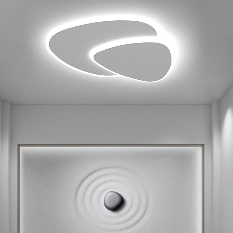 Bright LED triangle flush mount light, dimmable & color adjustable for any modern space.