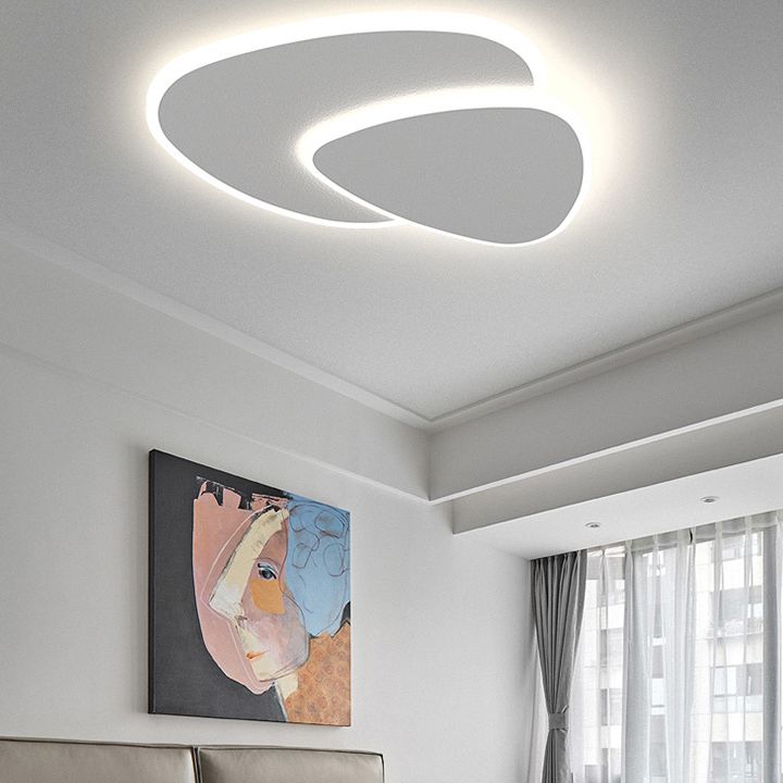 Sleek modern geometric LED ceiling light in a triangle design, ideal for contemporary homes.