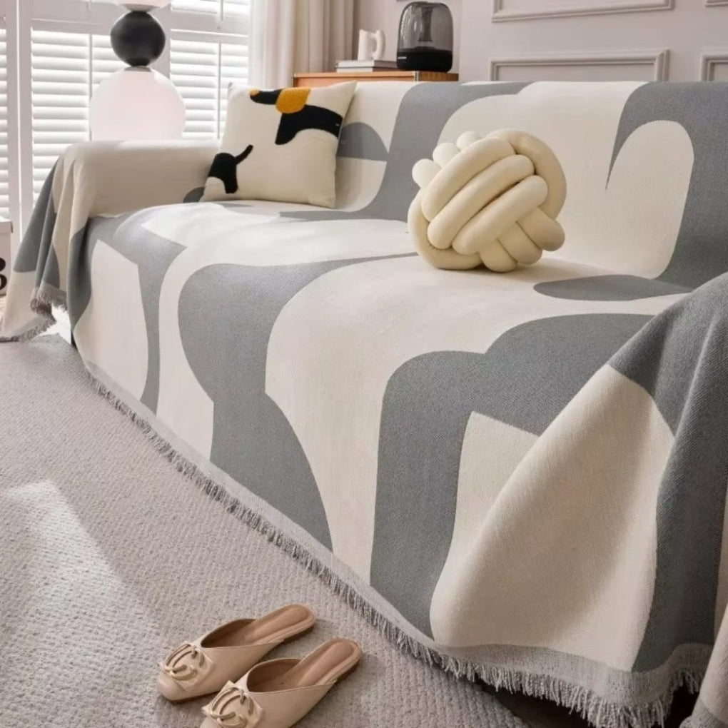 Stylish geometric pattern sofa cover, ideal for modern home decor, comfort, and furniture protection.