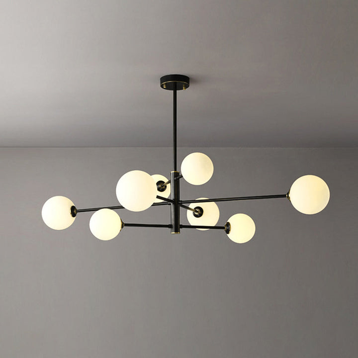 Black globe multi-light chandelier, sleek ceiling fixture adding modern elegance to any room.
