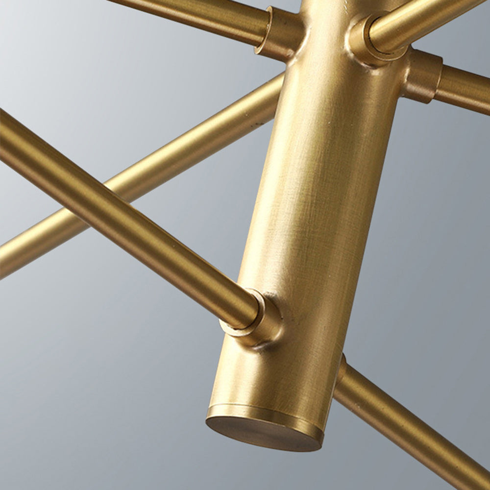 Elegant modern gold globe chandelier, multi-light design over a kitchen island, luxurious decor.