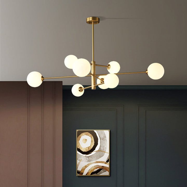 Contemporary multi-light pendant chandelier featuring sleek black globes, ideal for modern home decor.