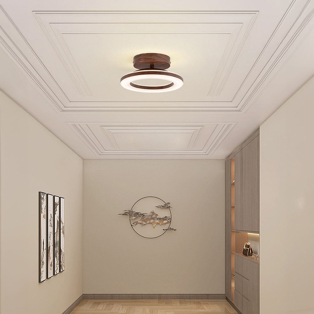 Round LED ceiling lamp, modern glow disc, perfect for interior lighting design.
