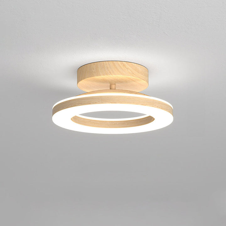 Sleek LED disc light fixture, perfect modern lighting for hallway or bedroom decor.