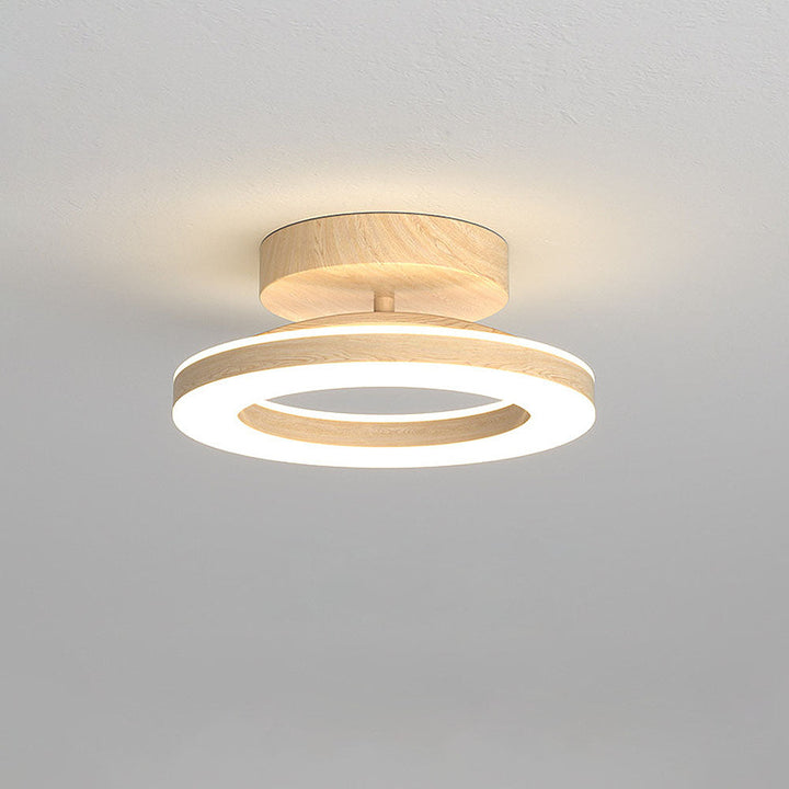 Elegant round ceiling fixture, ambient LED glow, ideal for contemporary home lighting.