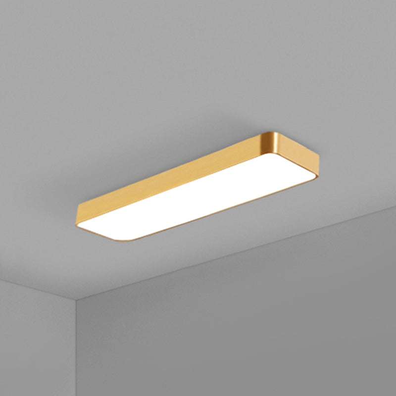 Modern gold rectangular LED recessed ceiling light for sleek home or office interior design.