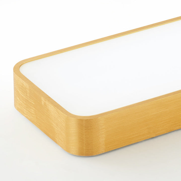 Stylish gold rectangular LED light, a flush mount ceiling fixture for modern office environments.