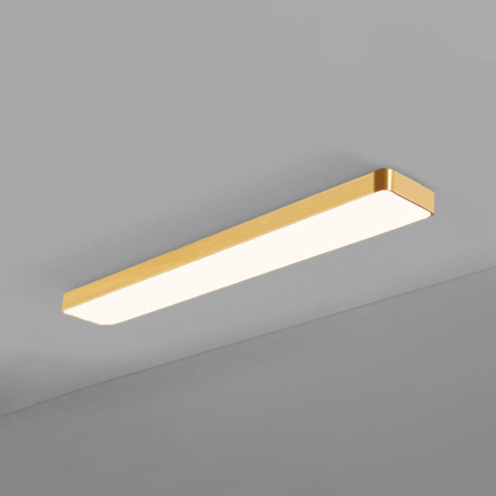 Minimalist gold rectangular LED ceiling light, an energy-efficient recessed option for modern spaces.
