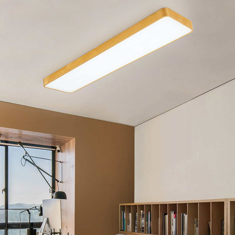 Bright gold LED recessed ceiling light, a stylish rectangular fixture for modern office spaces.