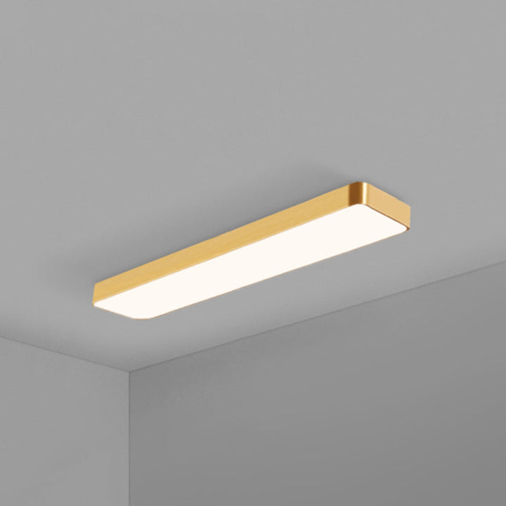 Designer gold rectangular LED recessed lighting, enhancing modern home and office aesthetics.
