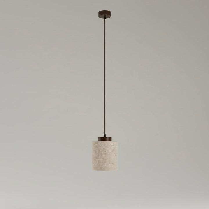 Sleek Nordic design pendant light, modern cord and natural travertine shade.