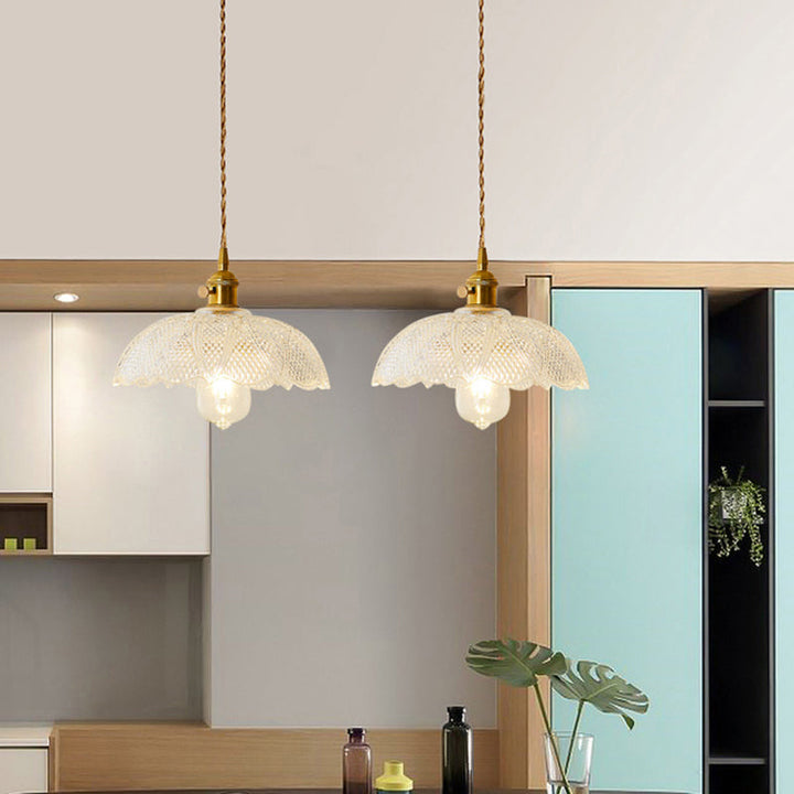 Modern industrial clear glass pendant light, a timeless piece for modern homes.