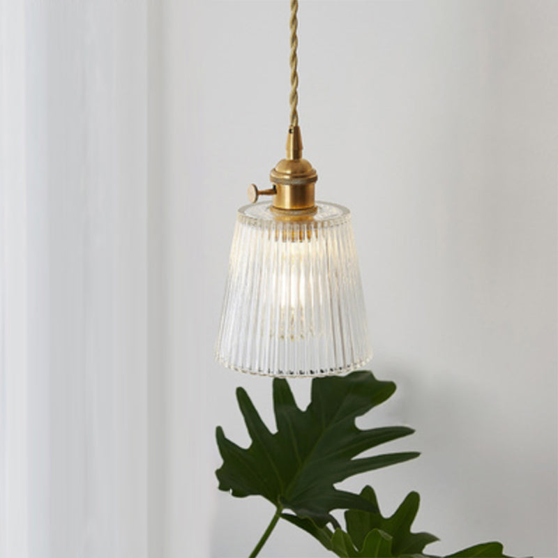 Industrial clear glass pendant for dining room, modern ceiling light fixture.