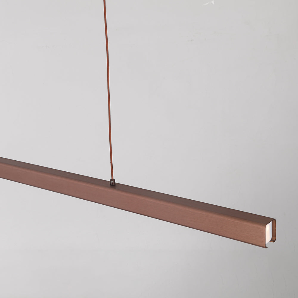 Modern linear lamp for dining rooms, a sleek adjustable LED fixture.