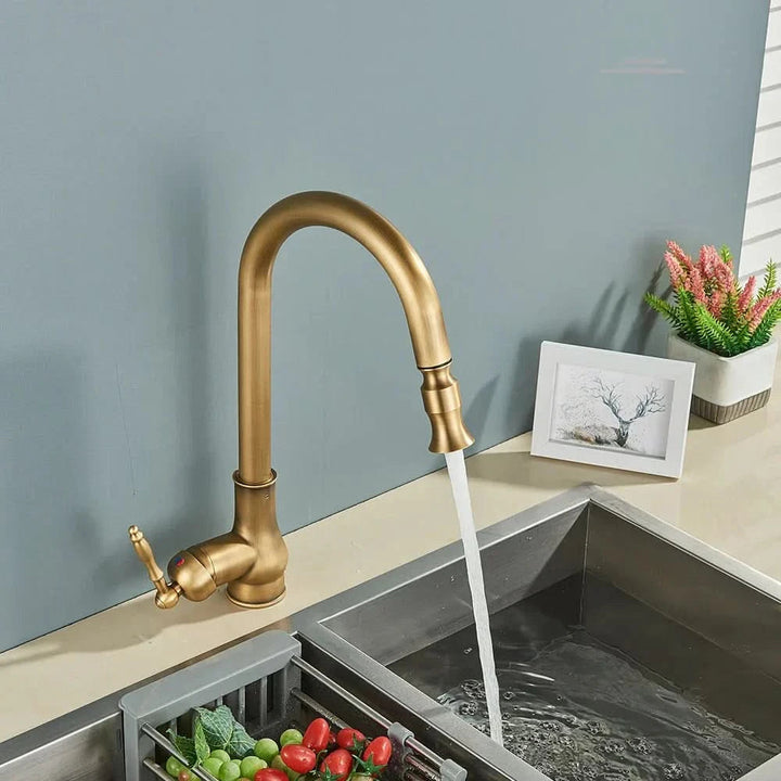 Sleek matte black kitchen faucet featuring a pull-out sprayer and 360° swivel spout, ceramic valve.
