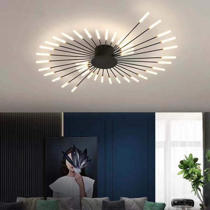 Gold LED flush light with elegant spiral design, offers bright, modern ambiance.