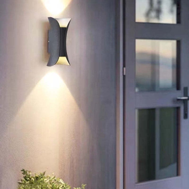 Weatherproof LED patio wall light, IP65 protection against elements.