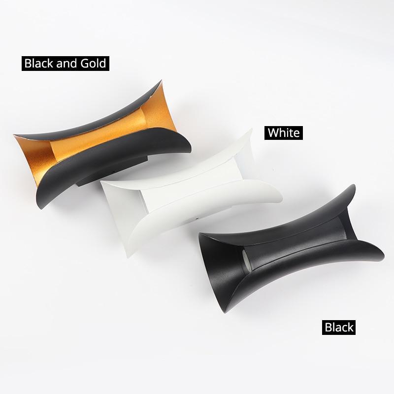Slim modern LED outdoor wall light, providing accent lighting for outdoor spaces.