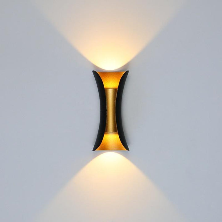 Sleek modern LED outdoor wall fixture, weather-resistant and energy-efficient.