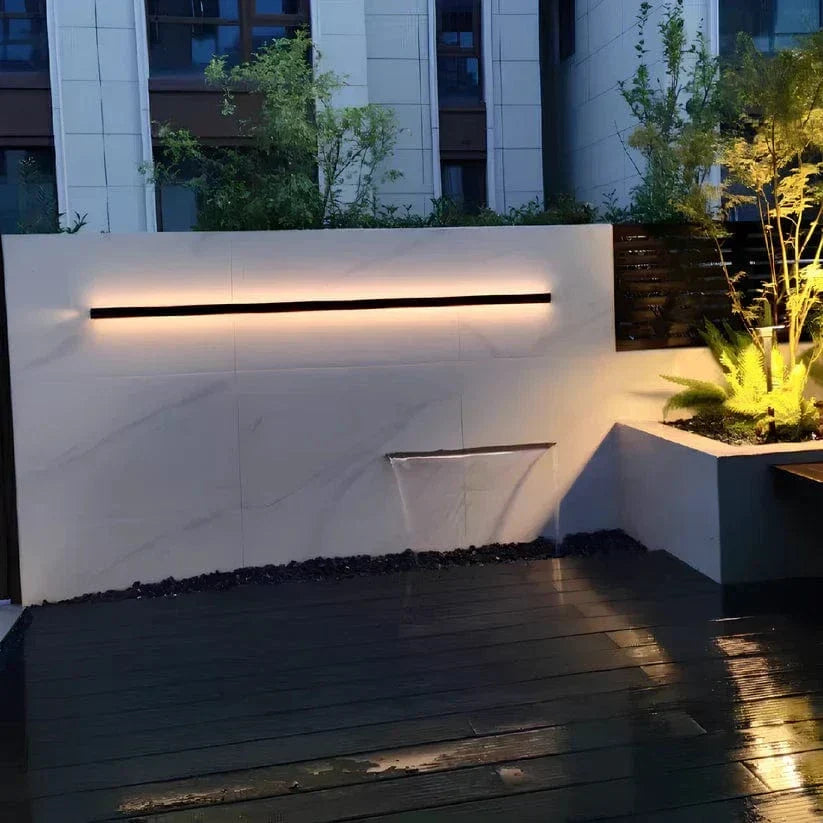 Contemporary exterior LED wall light, energy-saving, enhances any modern home facade.