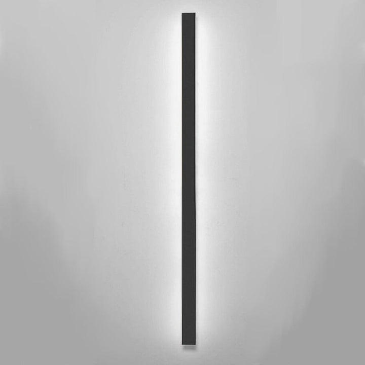 Architectural LED wall sconce, contemporary design, enhances garden lighting.