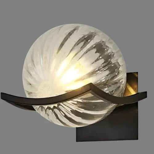 Modern LED wall lamp with sleek glass finish, ideal for contemporary home decor and energy-efficient lighting.