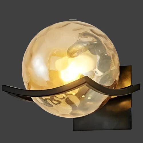 Modern LED wall lamp with sleek glass finish, ideal for contemporary home decor and energy-efficient lighting.